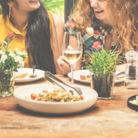 women communication dinner together 